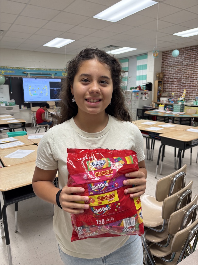 student with candy for trunk or treat