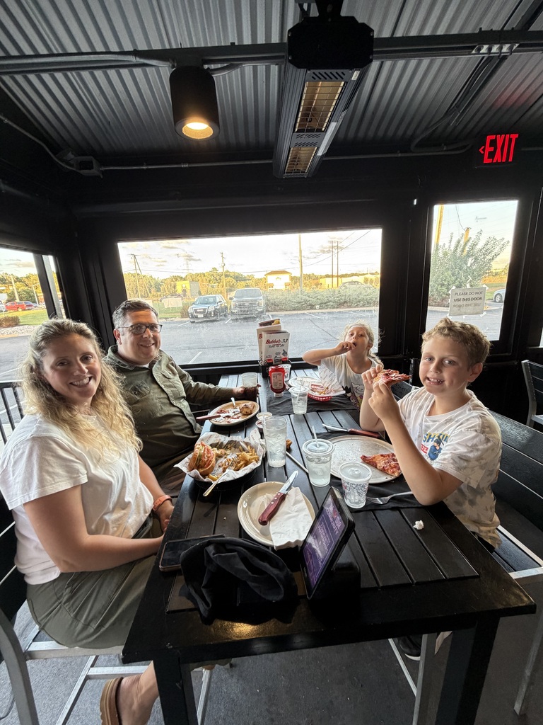 GTP family enjoying their dinner at Bubba's 33 for Dine to Donate night