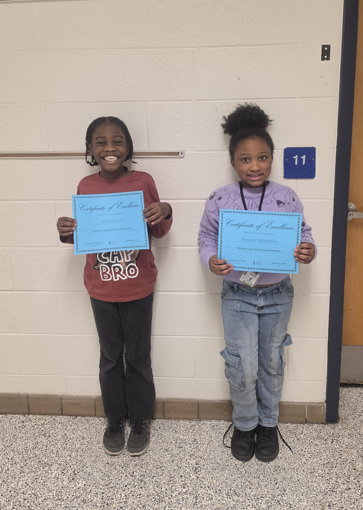Third grade IXL Leaderboard winners pose together with their certicates