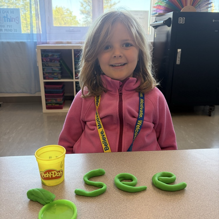 student using play dough to make sight words