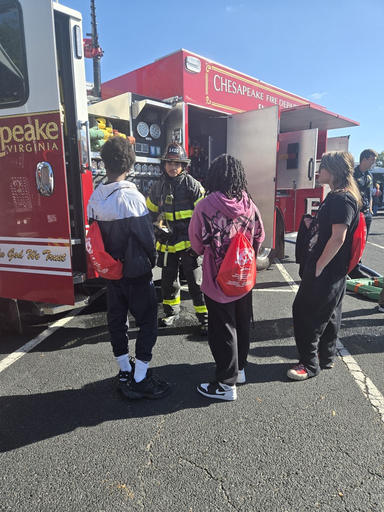 8th grade students participating in hands-on stations at the World of Work Field Trip 