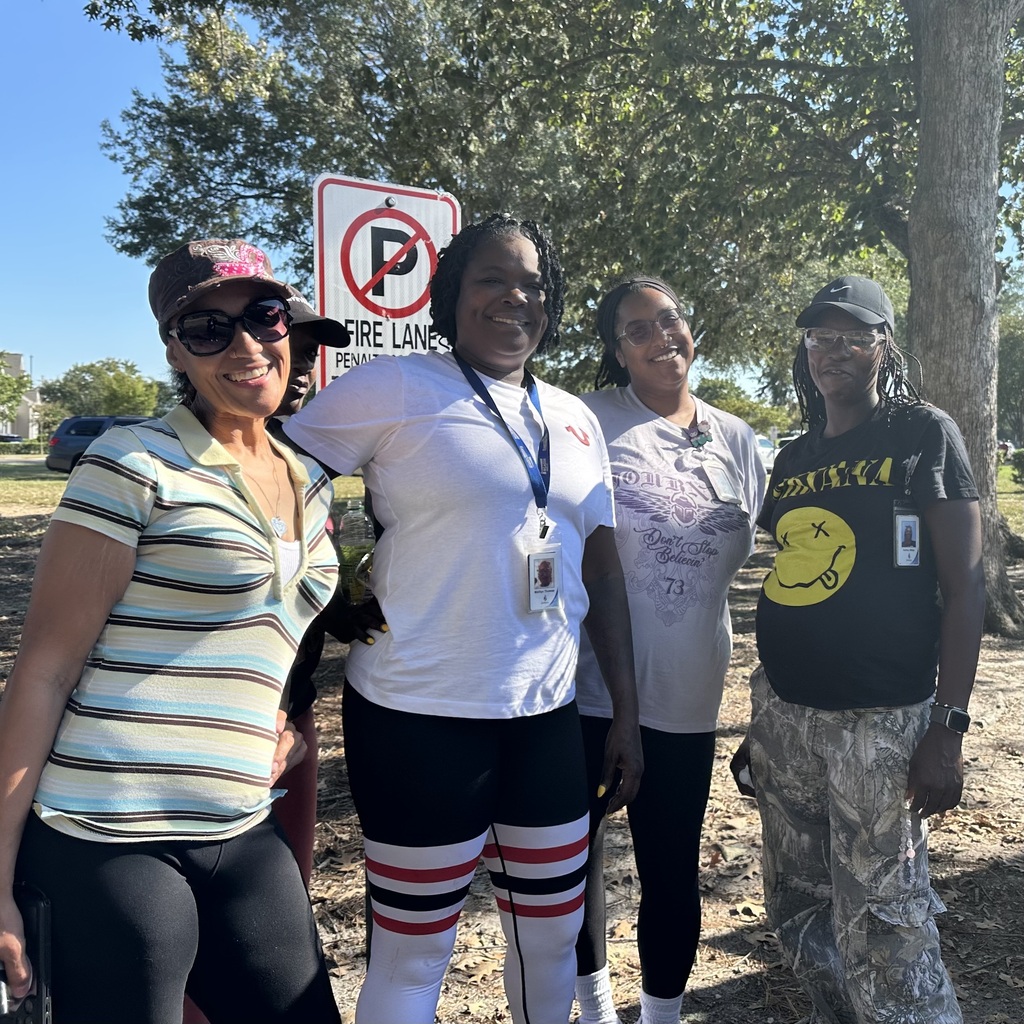 school bus driver smiling for photo for school bus driver appreciation week 