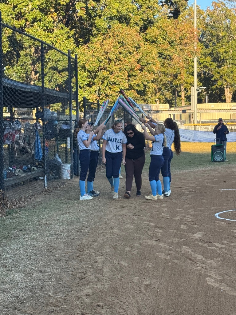 8th grade softball players being celebrated for 8th grade night