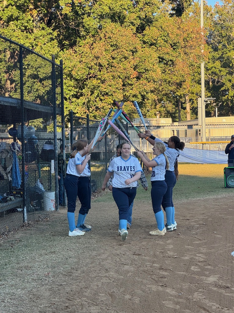 8th grade softball players being celebrated for 8th grade night