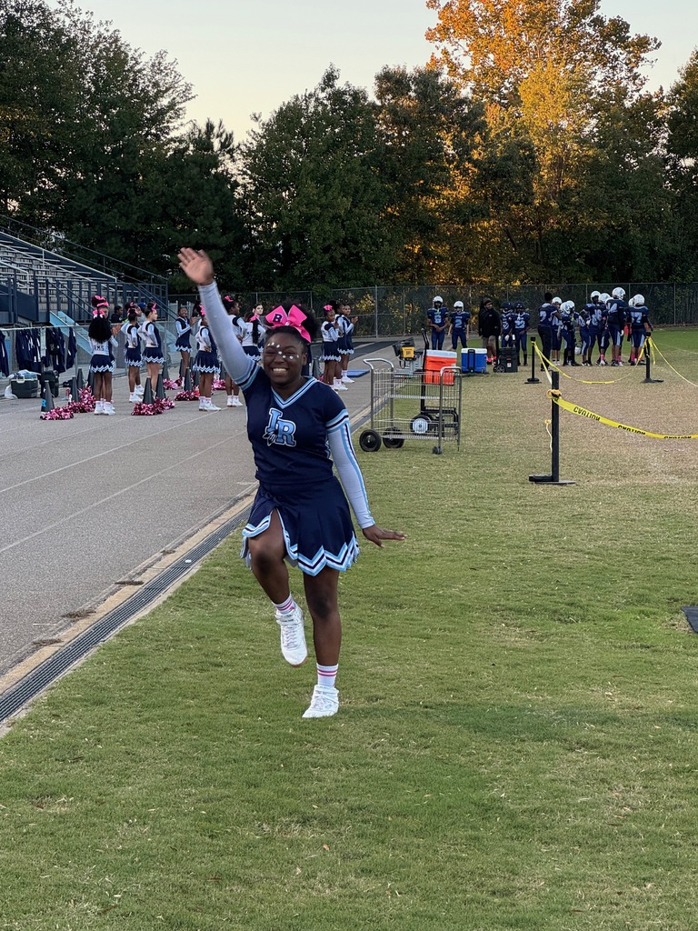 cheerleader about to do a stunt 