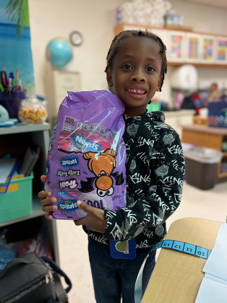 student with candy to donate