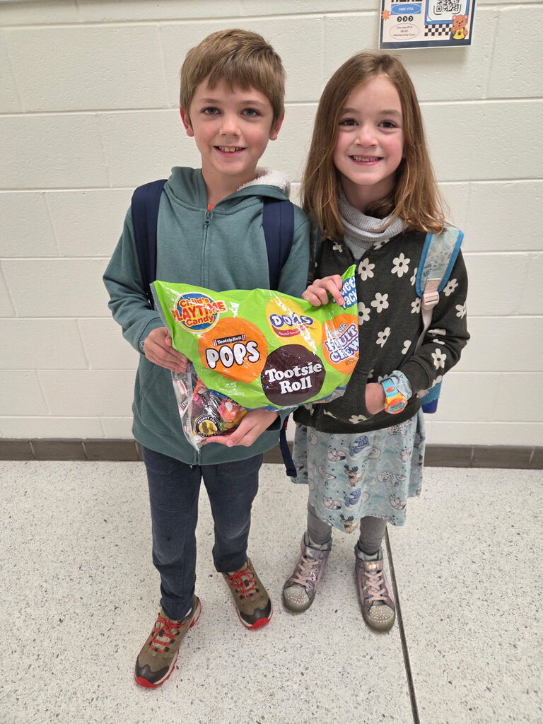 student with candy to donate
