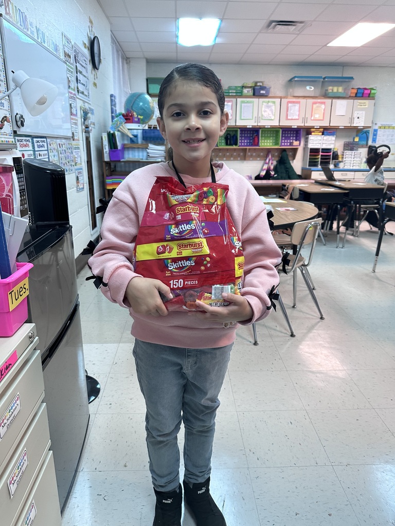student with candy to donate
