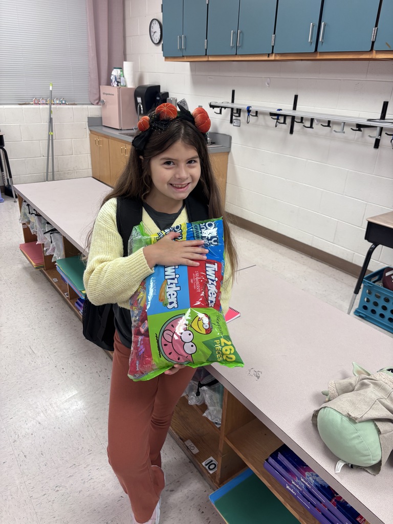 student with candy to donate
