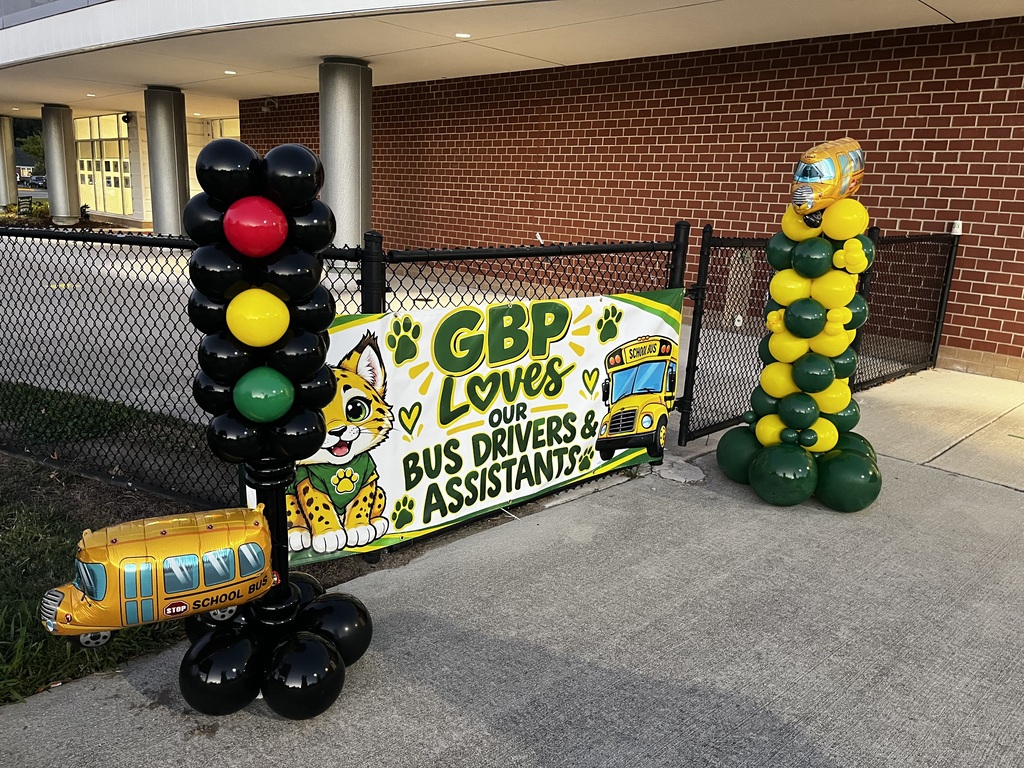 A picture of balloons and a banner set up for Bus Driver Appreciation Day on the Bus Ramp on October 21st.