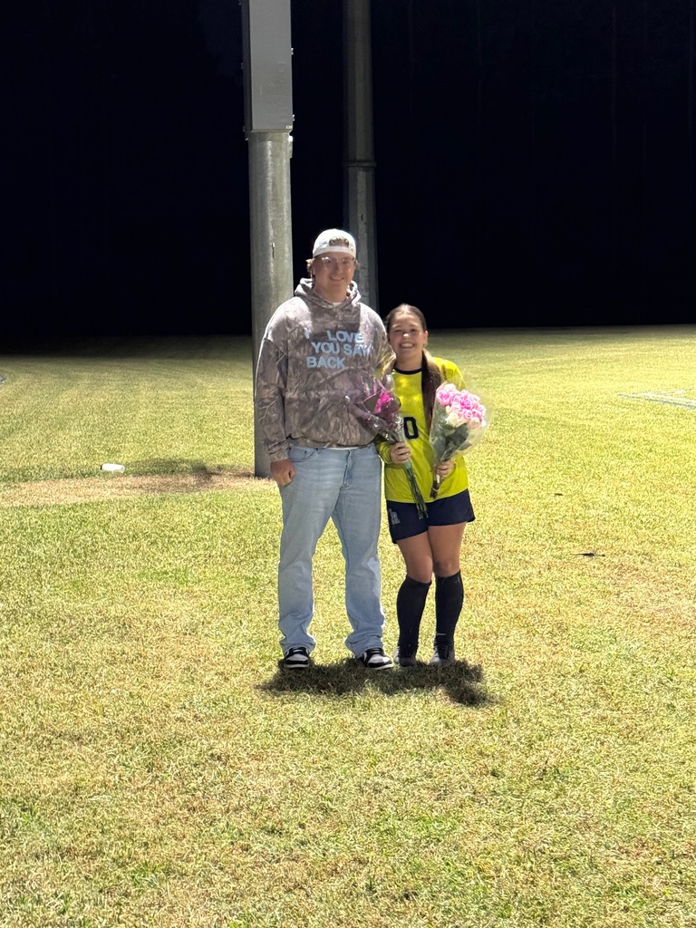 8th grade soccer player and her parent