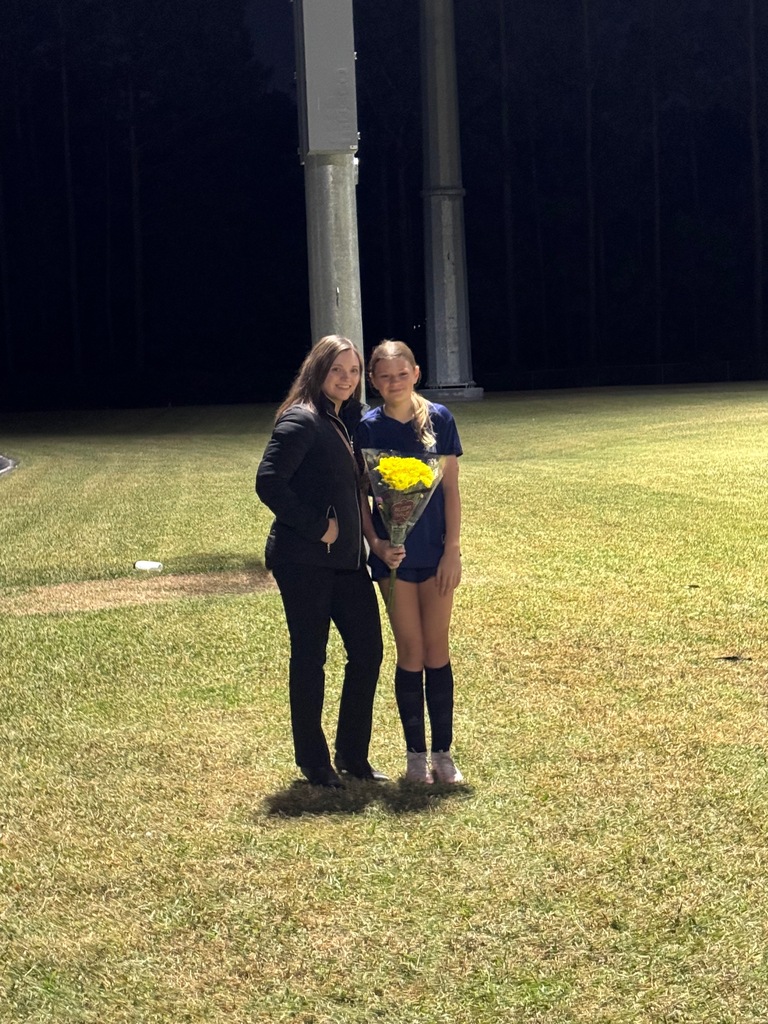 8th grade soccer player and her parent