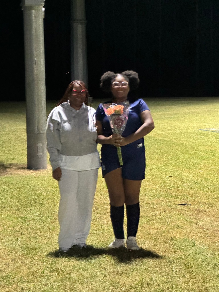 8th grade soccer player and her parent