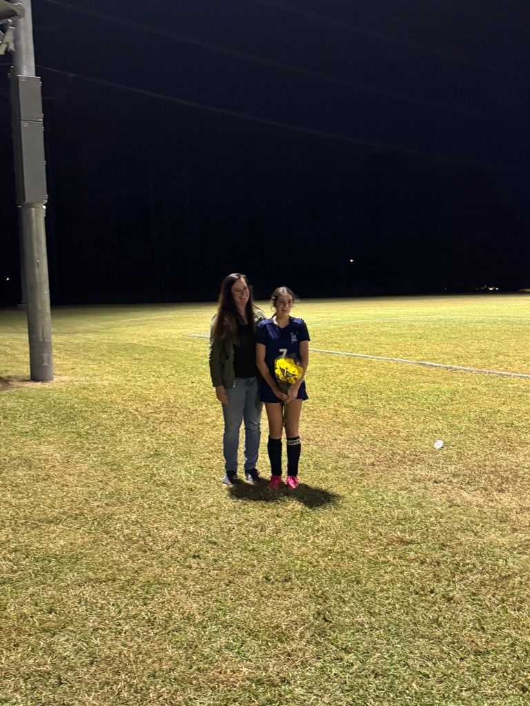 8th grade soccer player and her parent