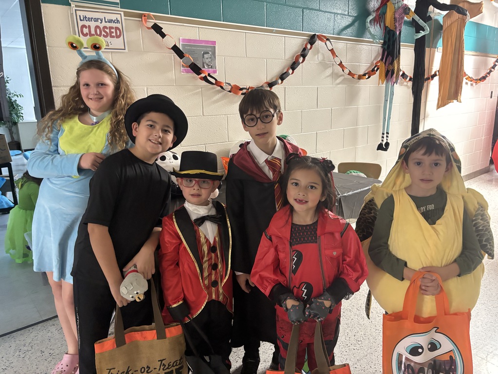 BRI families and students celebrate the first-ever Spooky Hall Crawl with Halloween costumes, trick-or-treating, candy, and fun throughout the school hallways.
