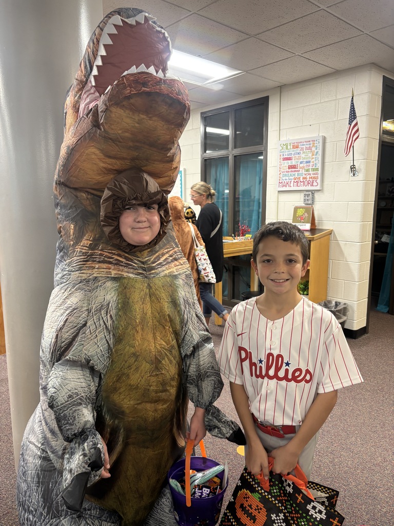BRI families and students celebrate the first-ever Spooky Hall Crawl with Halloween costumes, trick-or-treating, candy, and fun throughout the school hallways.