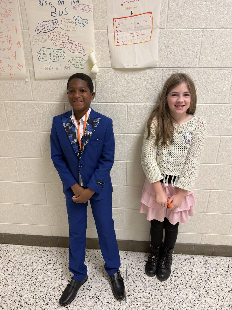 Two students dressed up for Dressed to impress day with big smiles!