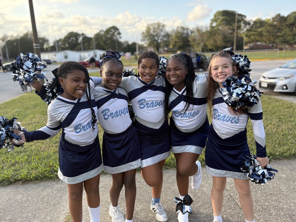 SRI Cheerleaders posing together.