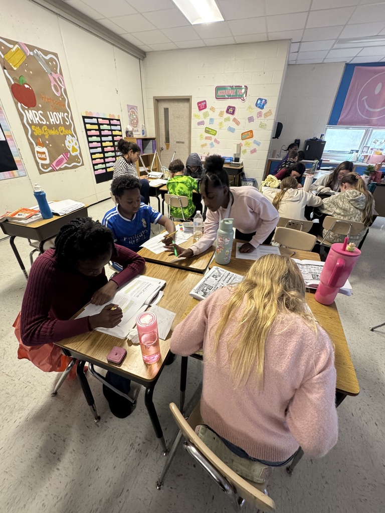 Kids working on geography