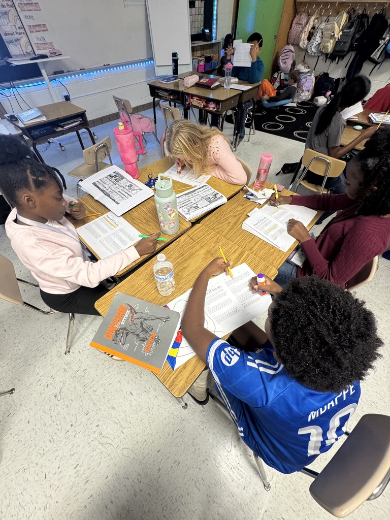 Kids working on geography