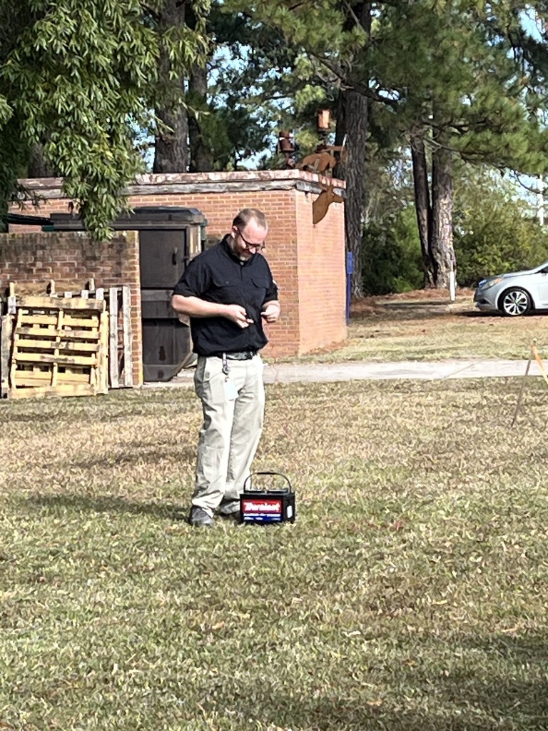 Mr. Snell getting ready for the pumpkin to explode