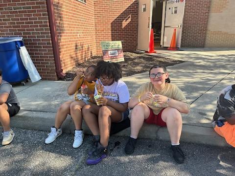 students enjoying kona ice