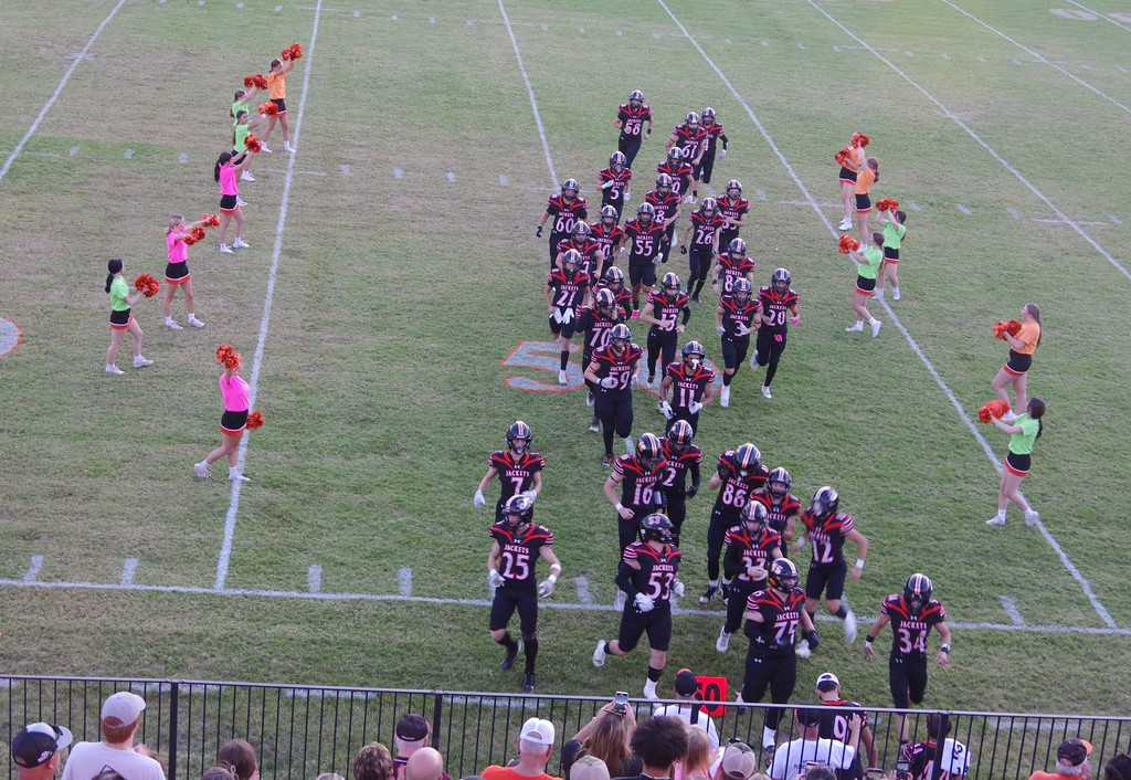 PHOTO 1 CHS FB Game 1 Team enters