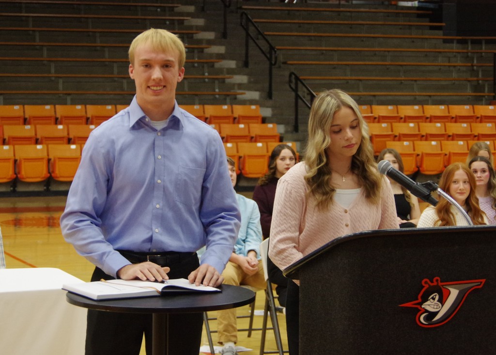 PHOTO 10 NHS Ethan Colvis signs register