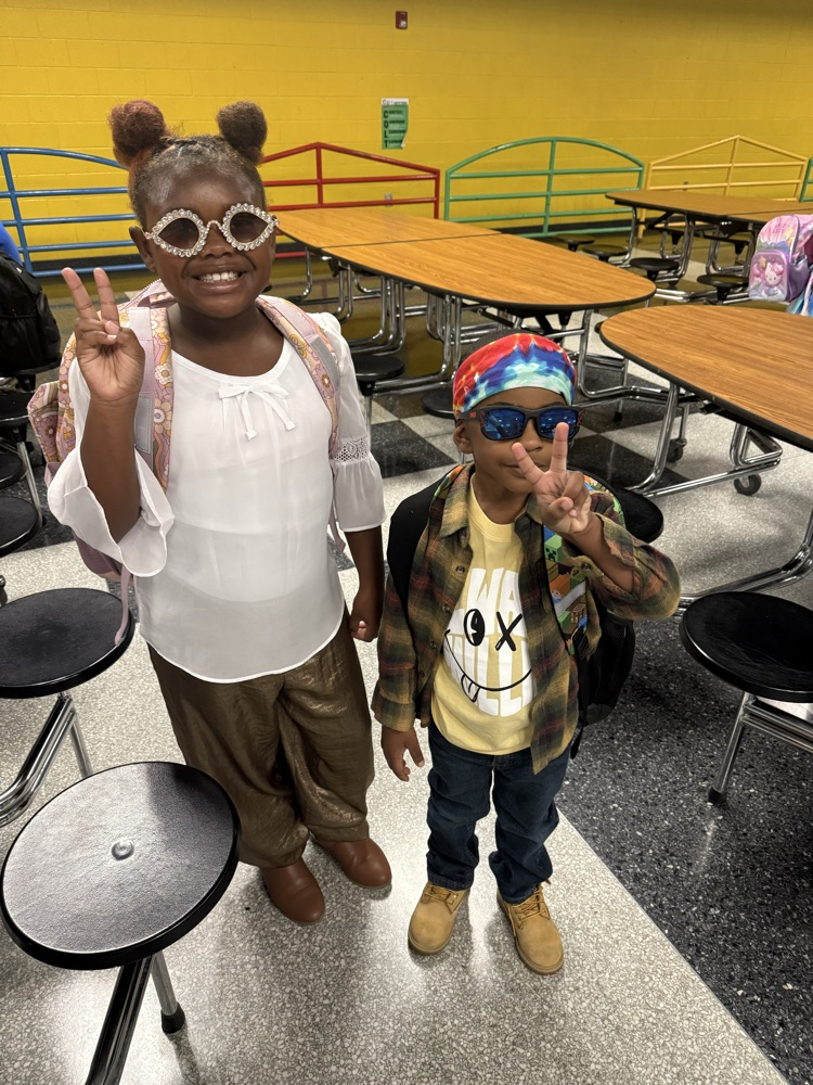 Students and staff dressed as hippies   