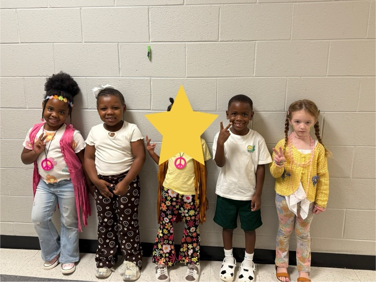 Students and staff dressed as hippies.  