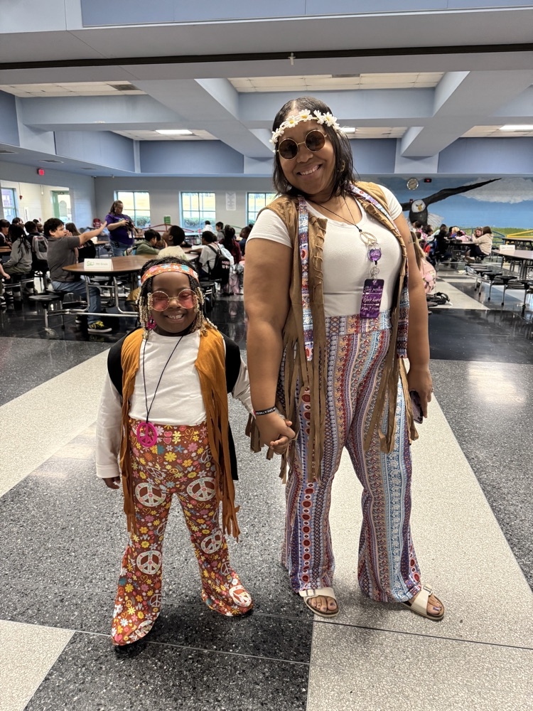Students and staff dressed as hippies.  