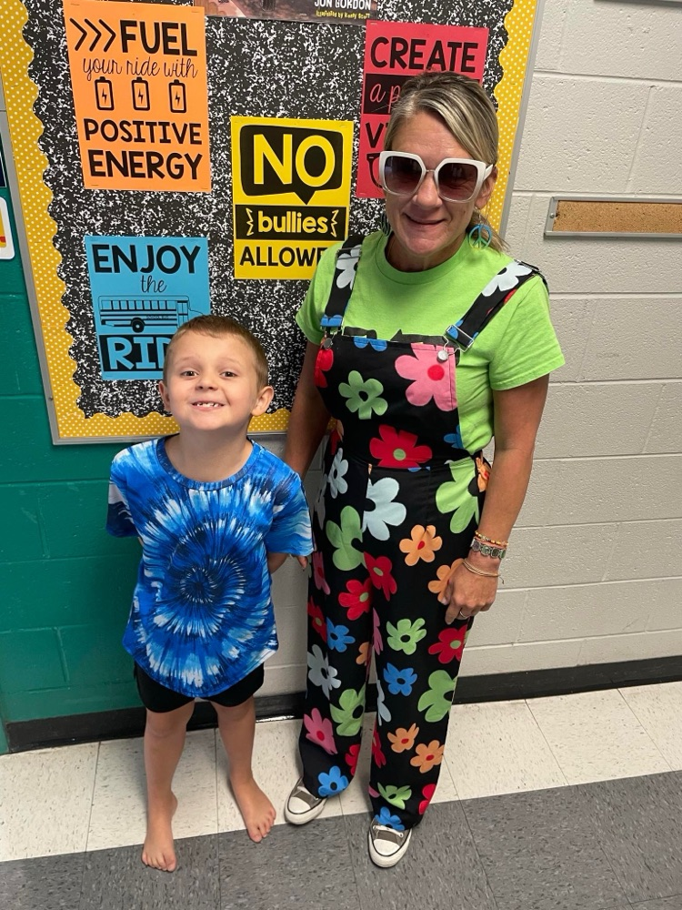 Students and staff dressed as hippies.  