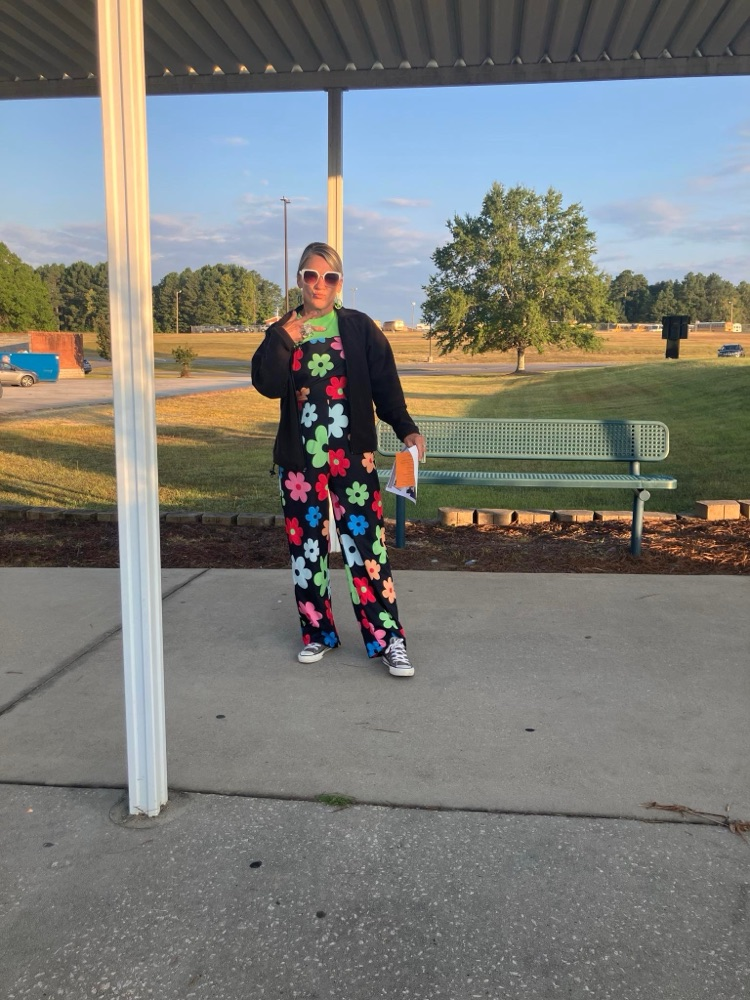 Students and staff dressed as hippies.  