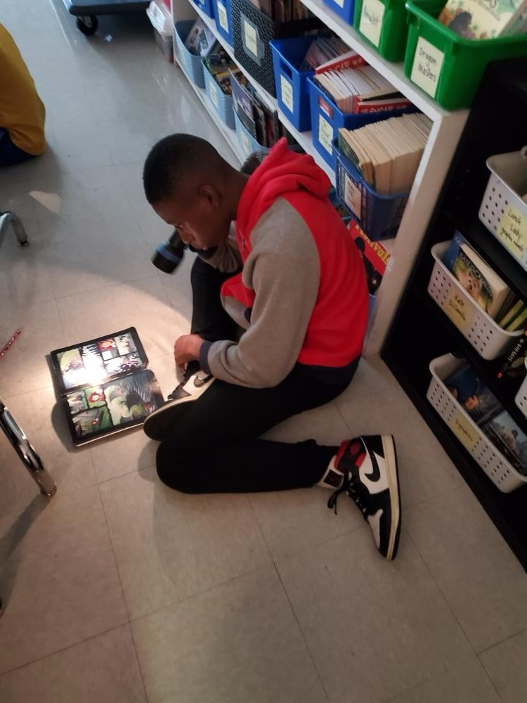 Mrs. Oliver’s class used flashlights to read on Friday  