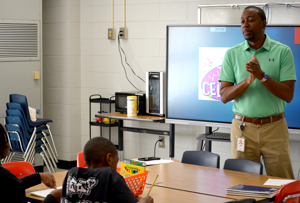 Dr. Sutton giving insight to students at Chester Park COLT.
