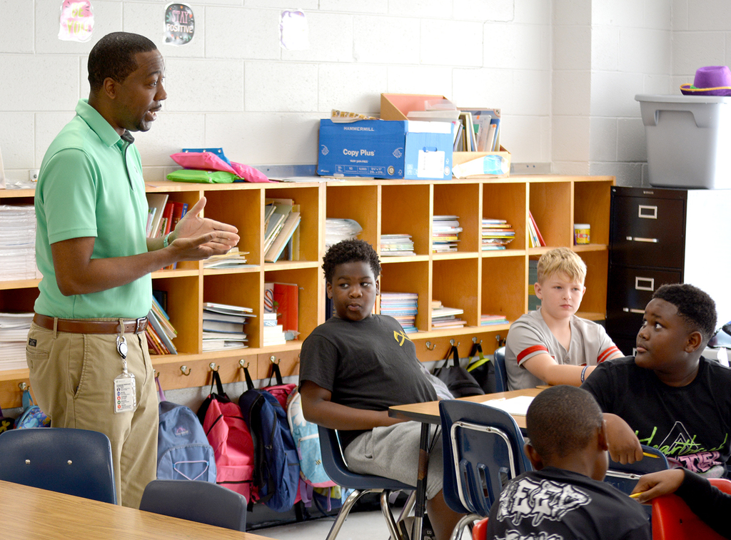 Dr. Sutton giving insight to students at Chester Park COLT.