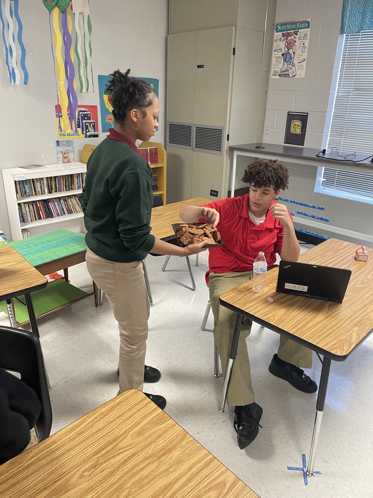 Sharing cookies with the high school students.