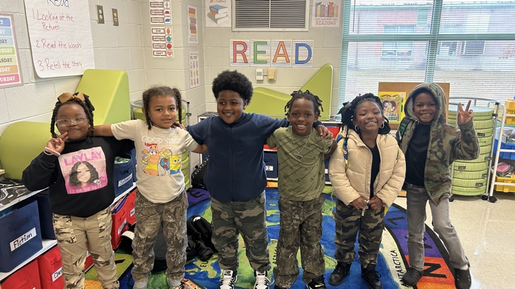 Students dressed in camo  