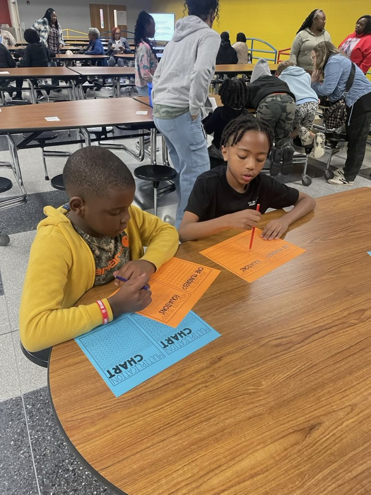 Third grade students enjoying family night  