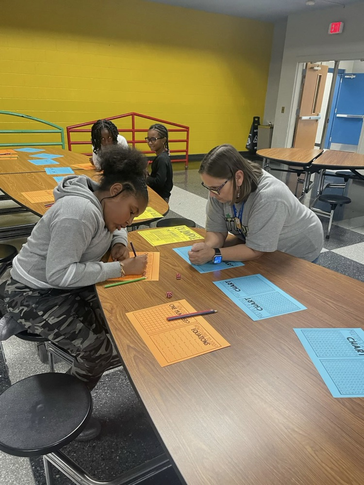 Third grade students enjoying family night. 