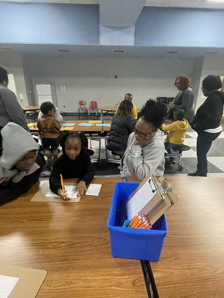 Third grade students enjoying family night. 