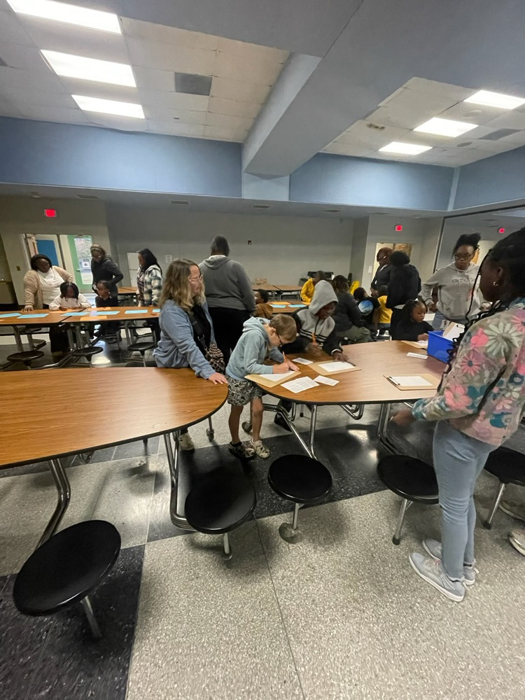 Third grade students enjoying family night. 