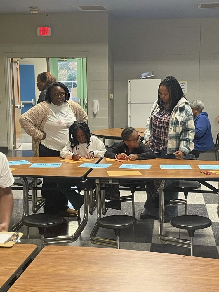 Third grade students enjoying family night. 