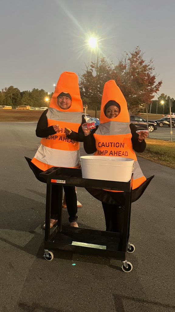 Our morning carline dressed as traffic cones
