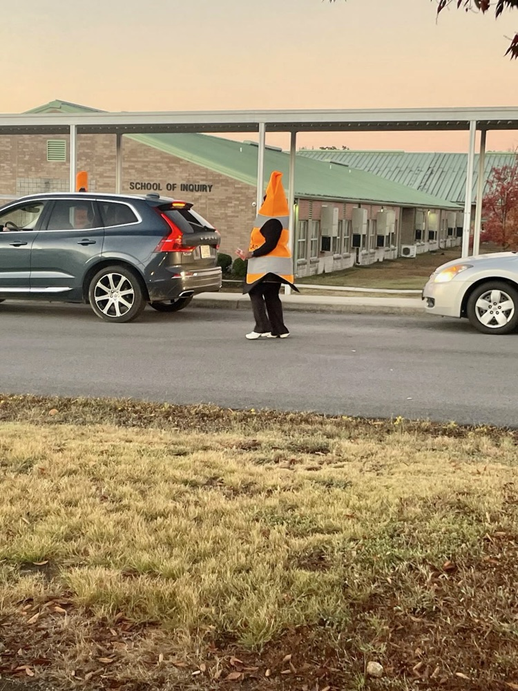 Our morning carline dressed as traffic cones.