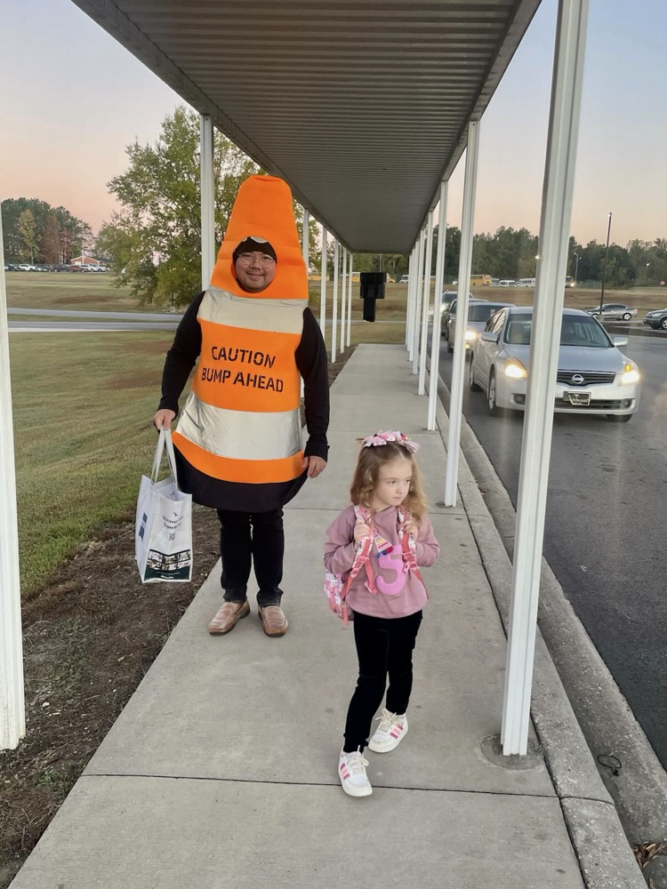 Our morning carline dressed as traffic cones.