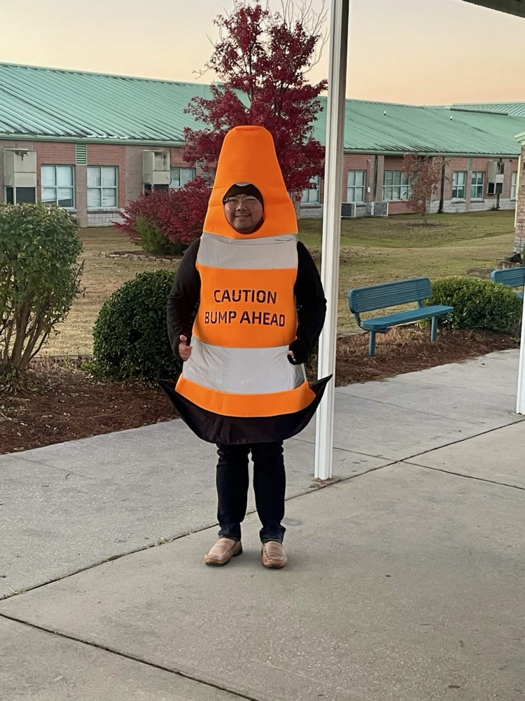 Our morning carline dressed as traffic cones.