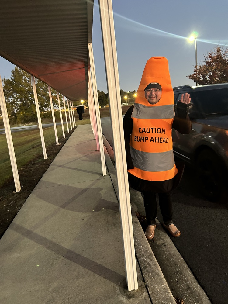Our morning carline dressed as traffic cones.
