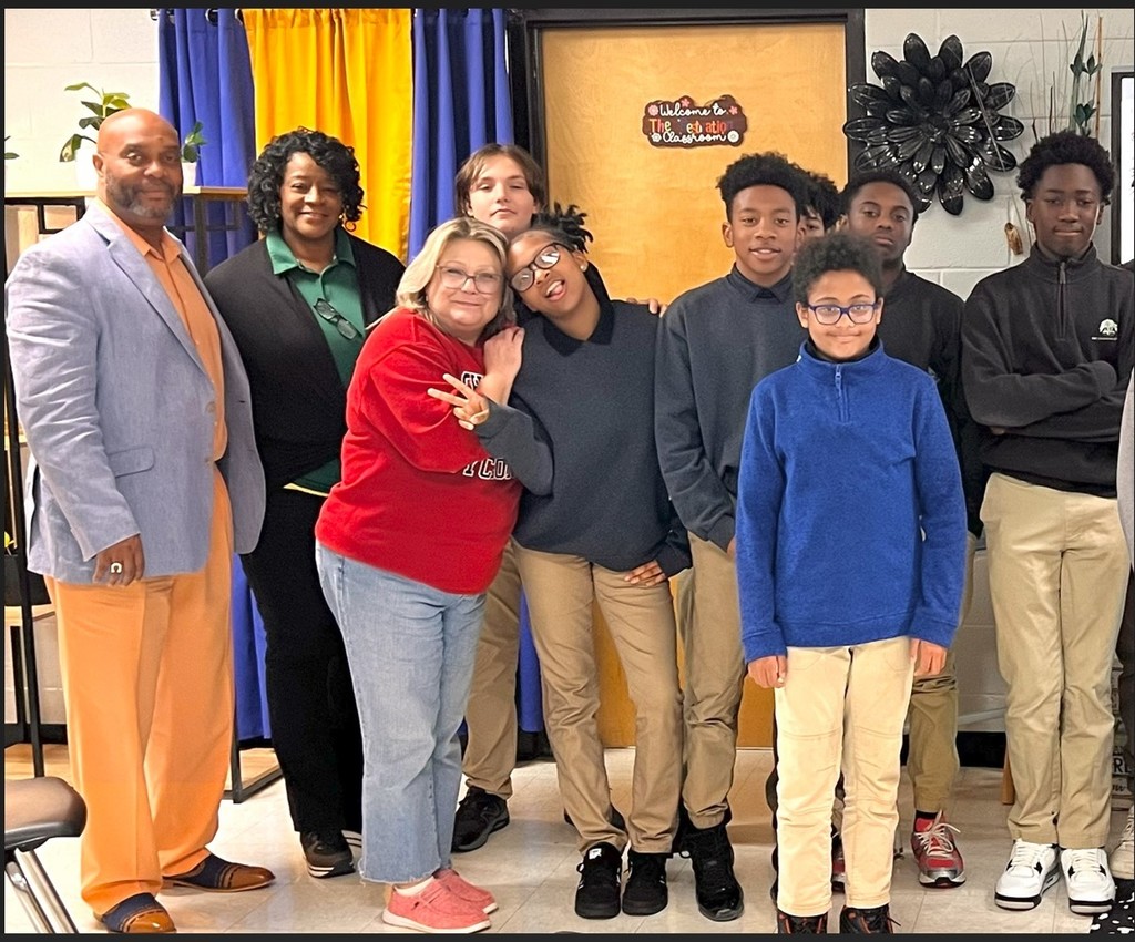 Speaker with students group picture.