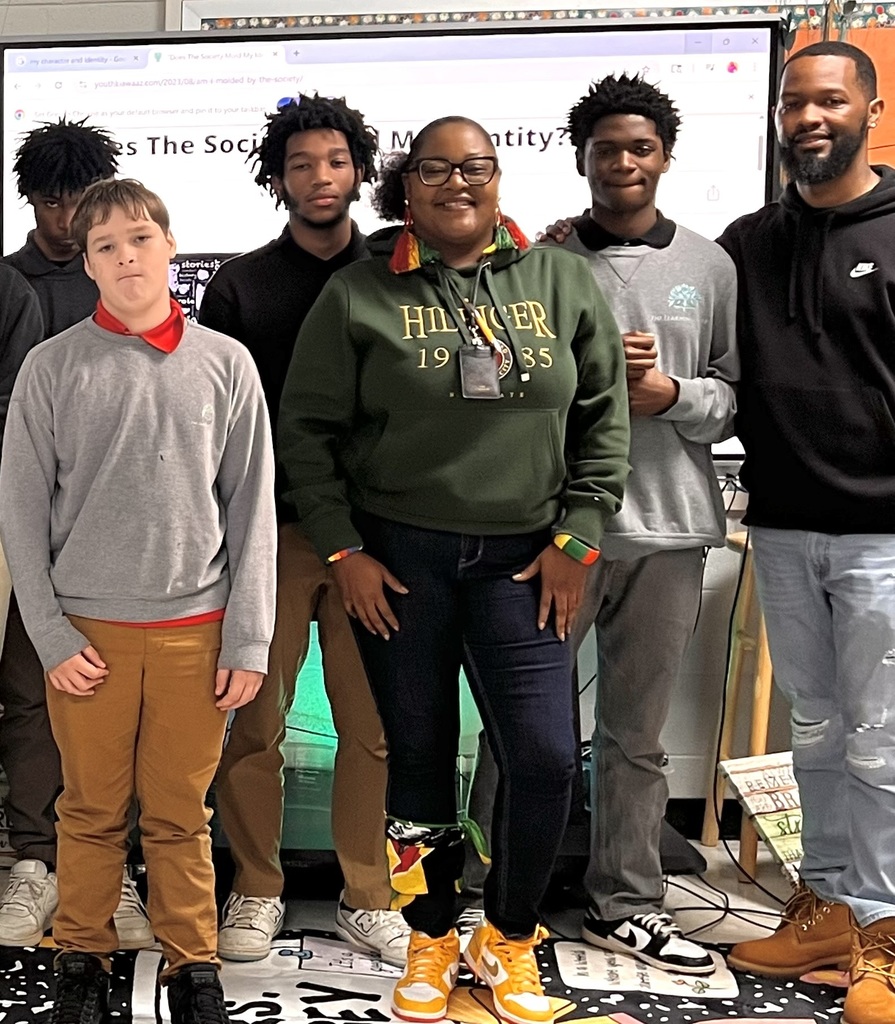 Speaker with students group picture.